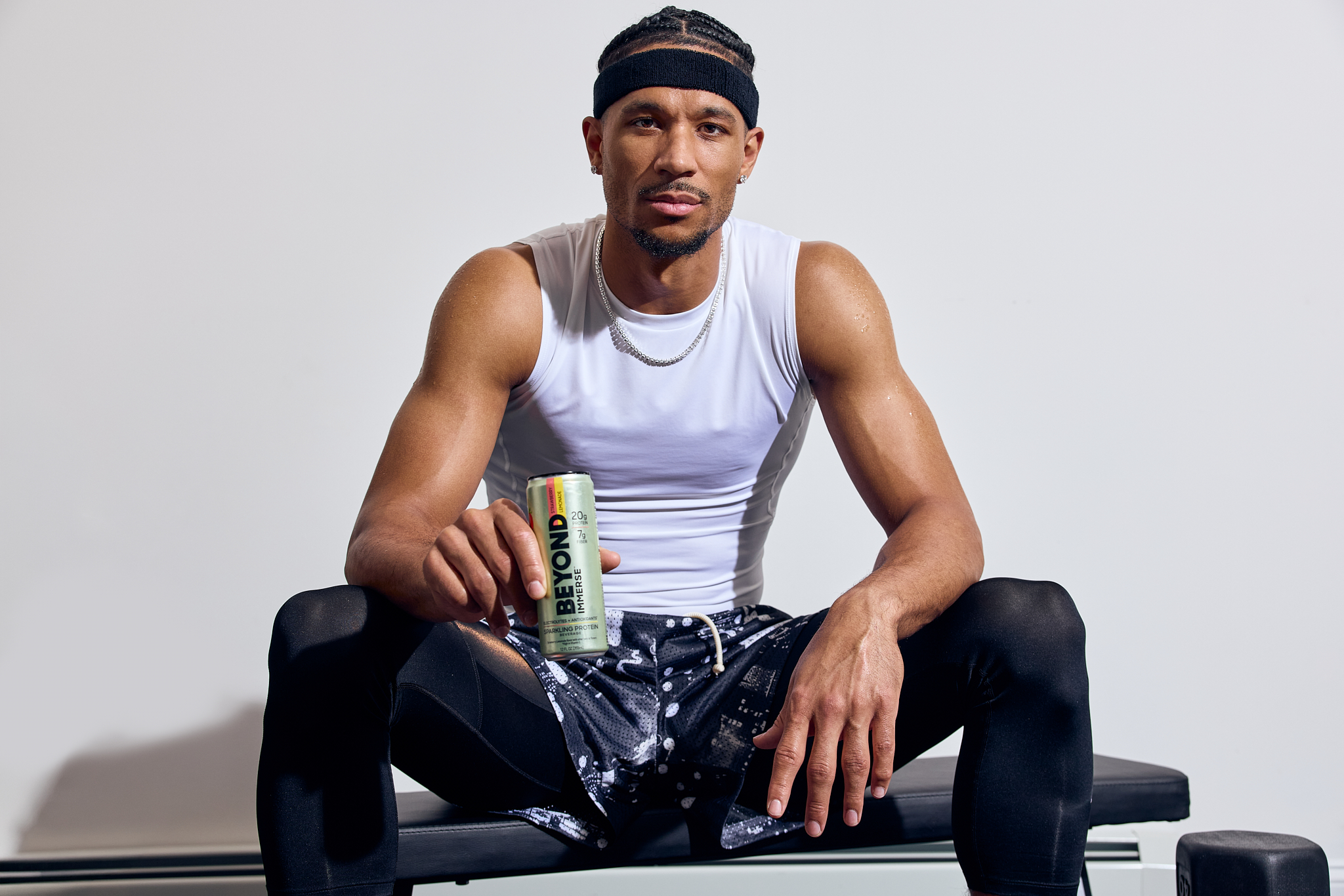 Josh Hart holding Beyond Immerse can