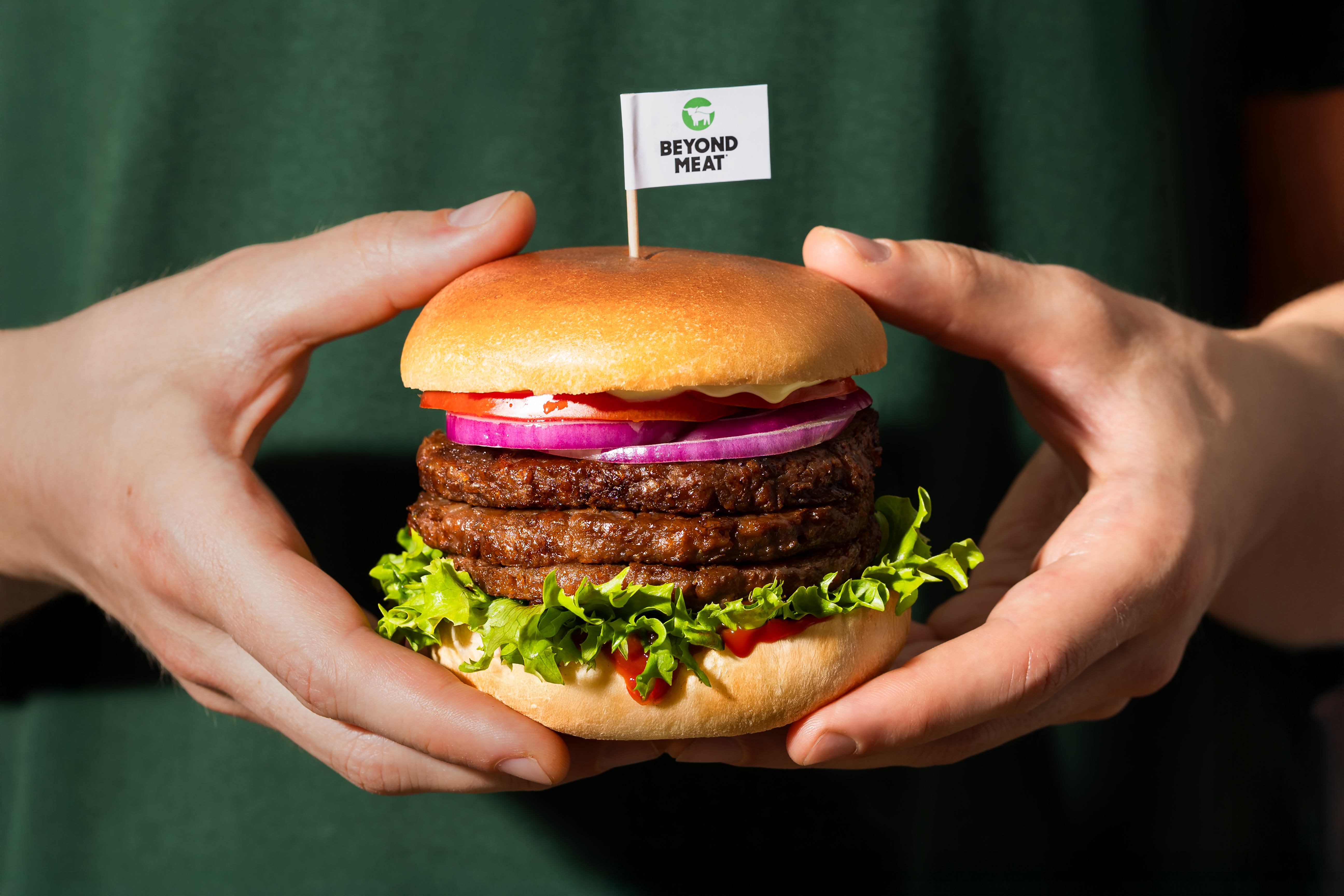 man eating burger